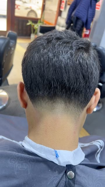 Detalle de un corte degradado publicado en el perfil de Kalifa